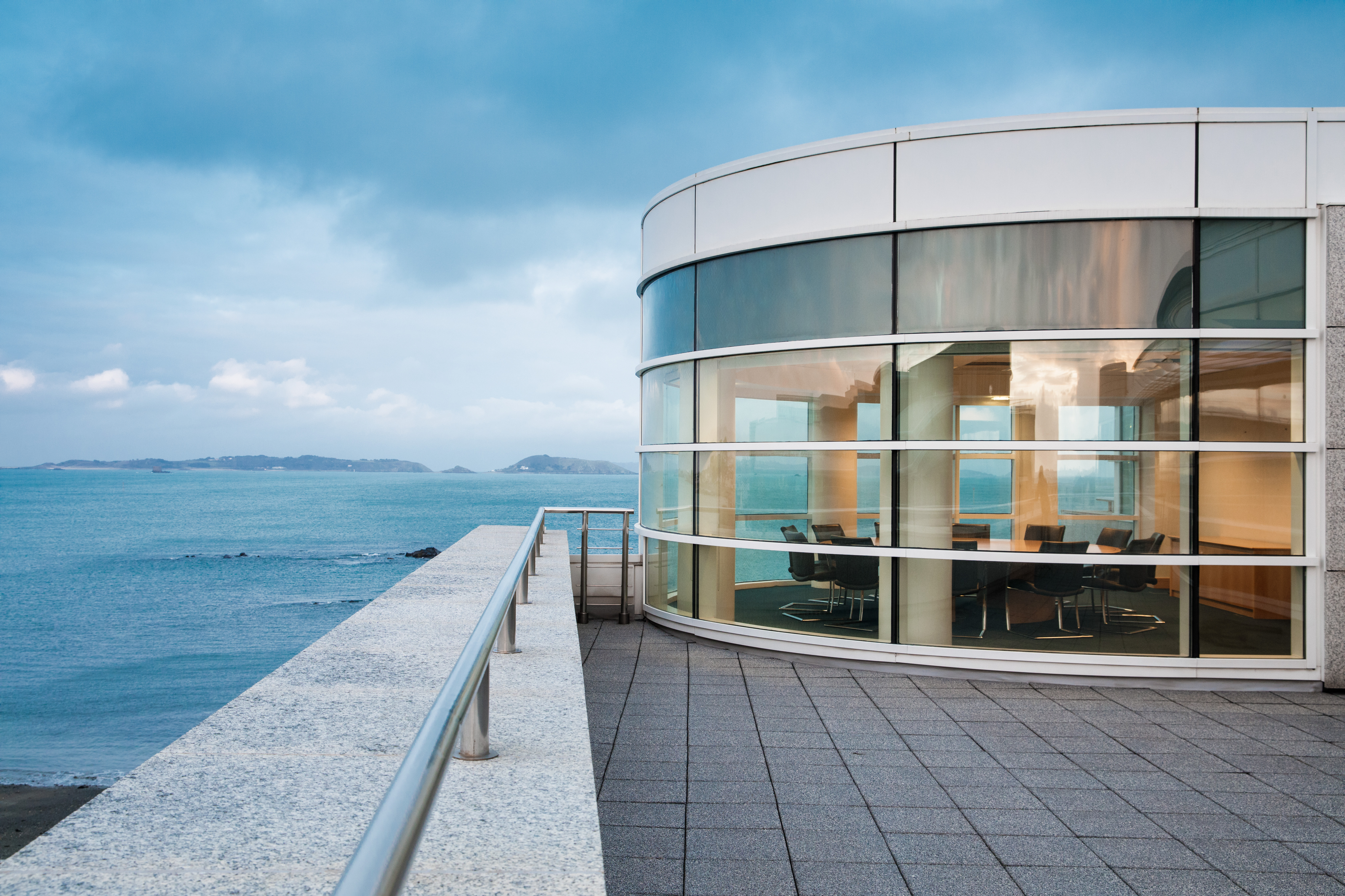 Round boardroom with a sea view at Admiral park, Guernsey